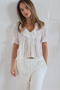 ruffle blouse white