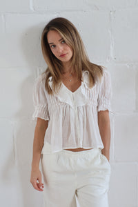 ruffle blouse white