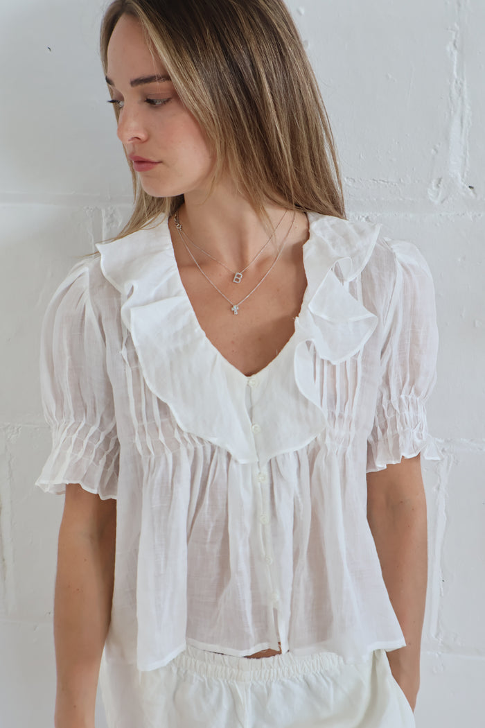 ruffle blouse white