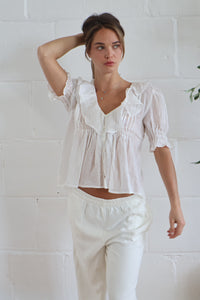 ruffle blouse white
