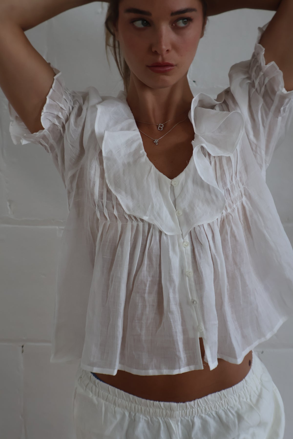 ruffle blouse white