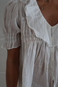 ruffle blouse white